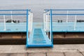 Floating pier for mooring small pleasure yachts and boats Royalty Free Stock Photo