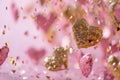 Floating Pink and Gold Hearts on a Soft Pink Backdrop for Love Themed Events and Valentine\'s Greetings Royalty Free Stock Photo