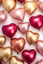 Floating Pink, Red and Gold Real Metallic Balloons Hearts on a White background, for Love Themed Events and