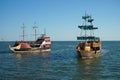 Floating pirate ships near the embankment of Berdyansk