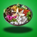 Floating Poke in bowl on green gradient Royalty Free Stock Photo