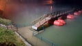 Floating pontoon bridge at foggy night and during flood Royalty Free Stock Photo