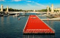 The floating race track installed on Seine river near Alexandre III bridge in Paris, France .