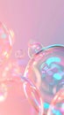 Floating rainbow soap bubbles on a colored background, copy space. Banner, poster. Royalty Free Stock Photo