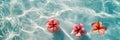 Floating Serenity: Frangipani Flowers on Transparent Ocean Waters Royalty Free Stock Photo