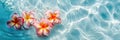 Floating Serenity: Frangipani Flowers on Transparent Ocean Waters Royalty Free Stock Photo