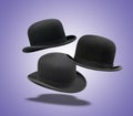 Floating Set of stylish black bowler hat Royalty Free Stock Photo