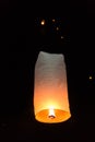 Floating sky lanterns during Loy Kratong Festival in Nan, Thailand Royalty Free Stock Photo