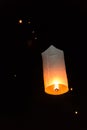 Floating sky lanterns during Loy Kratong Festival in Nan, Thailand Royalty Free Stock Photo