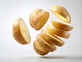 Floating Sliced Potatoes A Study in Suspended Motion and Fluid Dynamics Against a Pristine White Background Royalty Free Stock Photo