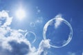 Floating Soap Bubbles Against Clear Sunlit Blue Sk Royalty Free Stock Photo