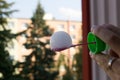 Floating soap bubbles filled with smoke on the bubble blower in hand of a married man. Royalty Free Stock Photo