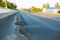 Floating substandard asphalt. Poor quality road Royalty Free Stock Photo