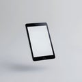 Floating tablet device isolated on white background Royalty Free Stock Photo