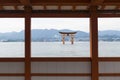 The Floating Torii gate framed by Itsukushima shrine in Miyajima, Japan. Royalty Free Stock Photo