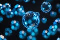 Floating translucent blue bubbles on black background Royalty Free Stock Photo