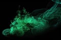 Floating translucent green smoke cloud on black background.