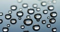 Floating transparent water droplets isolated on soft light blue background macro texture Royalty Free Stock Photo