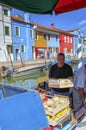 Floating vegetable market on Burano island, near Venice, Italy. Royalty Free Stock Photo