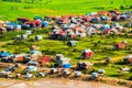 Floating village Phnom Krom, green rice fields, Tonle Sap, Siem Reap, Cambodia Royalty Free Stock Photo