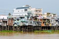 Floating village and selling motorboat on Bassac river Royalty Free Stock Photo