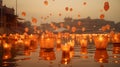 Floating on the water burning lanterns with candles flying off orange balloons into the sky, Hindu temples in the background.