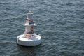 Floating white buoy in the sea