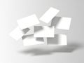 Floating white papers isolated on white background Royalty Free Stock Photo