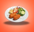 Floating White plate with two Shrimps croquettes ans salad