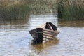 floating wooden boat Royalty Free Stock Photo