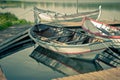 Floating Wooden Boats with Paddles Royalty Free Stock Photo