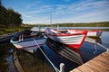 Floating Wooden Boats with Paddles Royalty Free Stock Photo