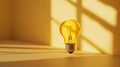 Floating yellow lightbulb casting shadow in sunny room, innovation concept Royalty Free Stock Photo