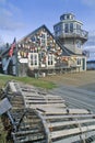 Floats from fishing nets hang on the side of a lighthouse in Stonington, Mount Desert Island, Maine