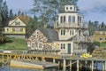 Floats from fishing nets hang on the side of a lighthouse in Stonington, Mount Desert Island, Maine