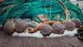 Floats and a green fishing net are piled up Royalty Free Stock Photo