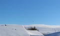 Wild geese flying over snow covered town Royalty Free Stock Photo