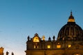 Rome - Flock of birds flying  over illuminated facade of the Saint Peter Basilica in the Vatican City, Rome, Italy Royalty Free Stock Photo