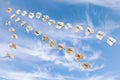 Flock of flying books in blue sky Royalty Free Stock Photo