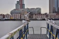 A flock of gulls on the rails of the pier on a cloudy day Royalty Free Stock Photo