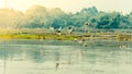 Flock of migratory birds flying over lake. The freshwater and coastal bird species spotted in Western Ghats region of Nelapattu Royalty Free Stock Photo