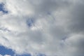 A flock of migratory wild geese flies to warmer climes in October against a cloudy sky over Berlin, Germany.