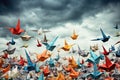 a flock of origami birds flying against a cloudy sky backdrop Royalty Free Stock Photo