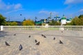 Flock of pigeons on viewing platform with view of Trinity Lavra of St. Sergius in Sergiev Posad, Russia