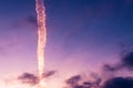 Flock of seagulls flying across colorful sunset sky Royalty Free Stock Photo