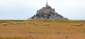 flock of SUFFOLK sheep and the abbey of Mont Saint Michel in France Royalty Free Stock Photo