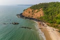 a flock of white small birds on the seashore on the sand view fron top drone in Goa Royalty Free Stock Photo