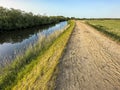 Flood barrier or dike, and a sandy hiking path.