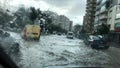 Flood in Bayrakli Izmir Turkey. Vehicles have difficulty while entering the inters