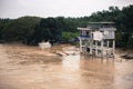 Flood caused by tropical storm near river town in Malaysia Royalty Free Stock Photo